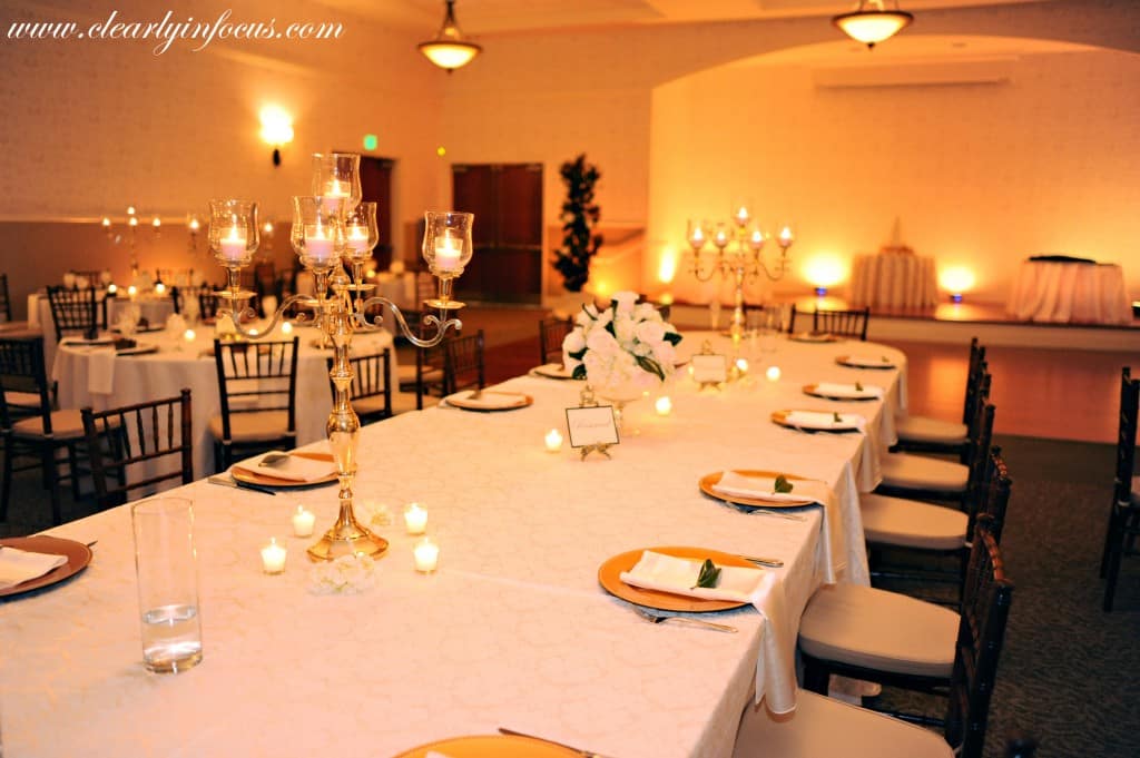orlando wedding dj and uplighting - lake mary event center wedding - clearly in focus - amber uplighting