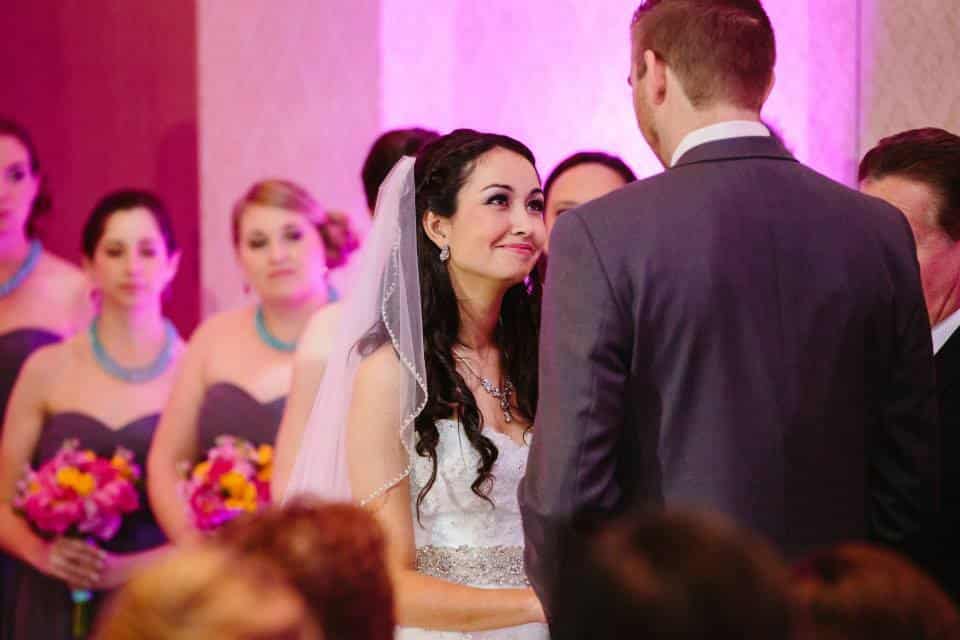 The Happy Couple saying their I do's at Mission Inn. Lighting by: Our DJ Rocks 