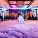 dancing on a cloud - wedding first dance - alfond inn wedding - purple and teal uplighting