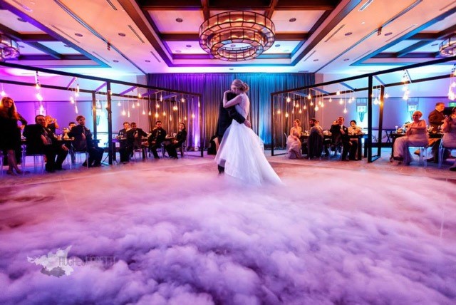 dancing on a cloud - wedding first dance - alfond inn wedding - purple and teal uplighting