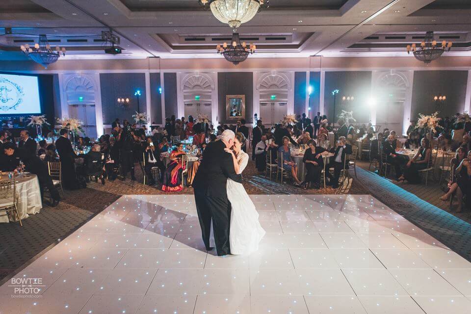 father daughter dance on a white dance floor at reunion resort in orlando florida