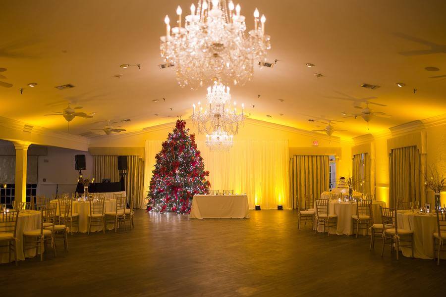 amber uplighting at highland manor with christmas tree