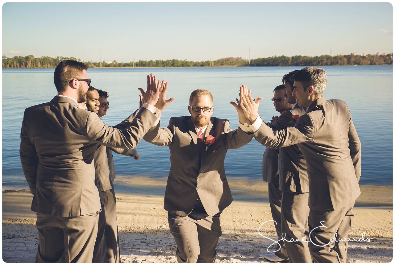 DJ Entertainment at Paradise Cove wedding groom and groomsmen grand entrance with high fives
