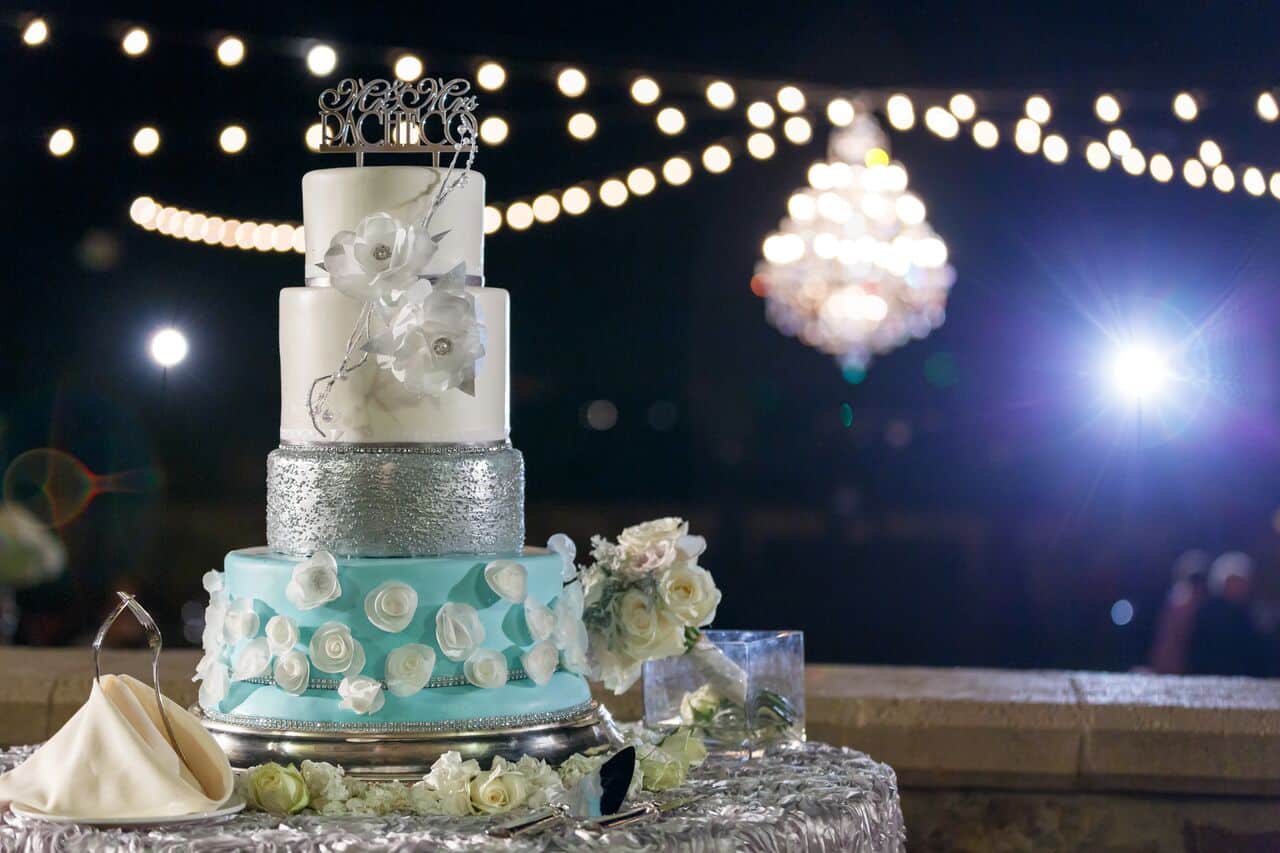 Wedding DJ at Bella Collina blue and white wedding cake