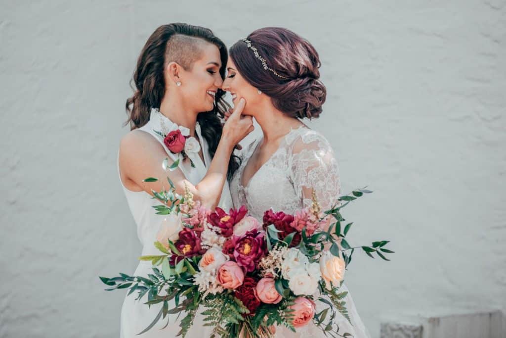two brides sharing a sweet moment