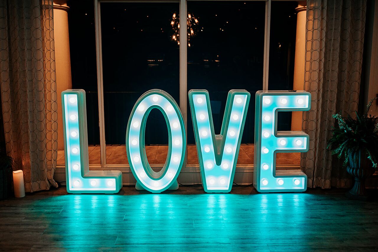 "love" marquis-style sign