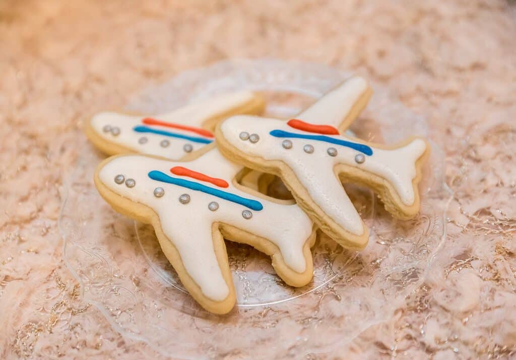 airplane-shaped cookies at wedding dessert table
