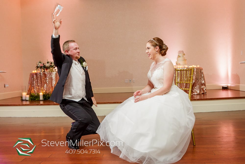 Video: Another groom really goes in on his bride during garter