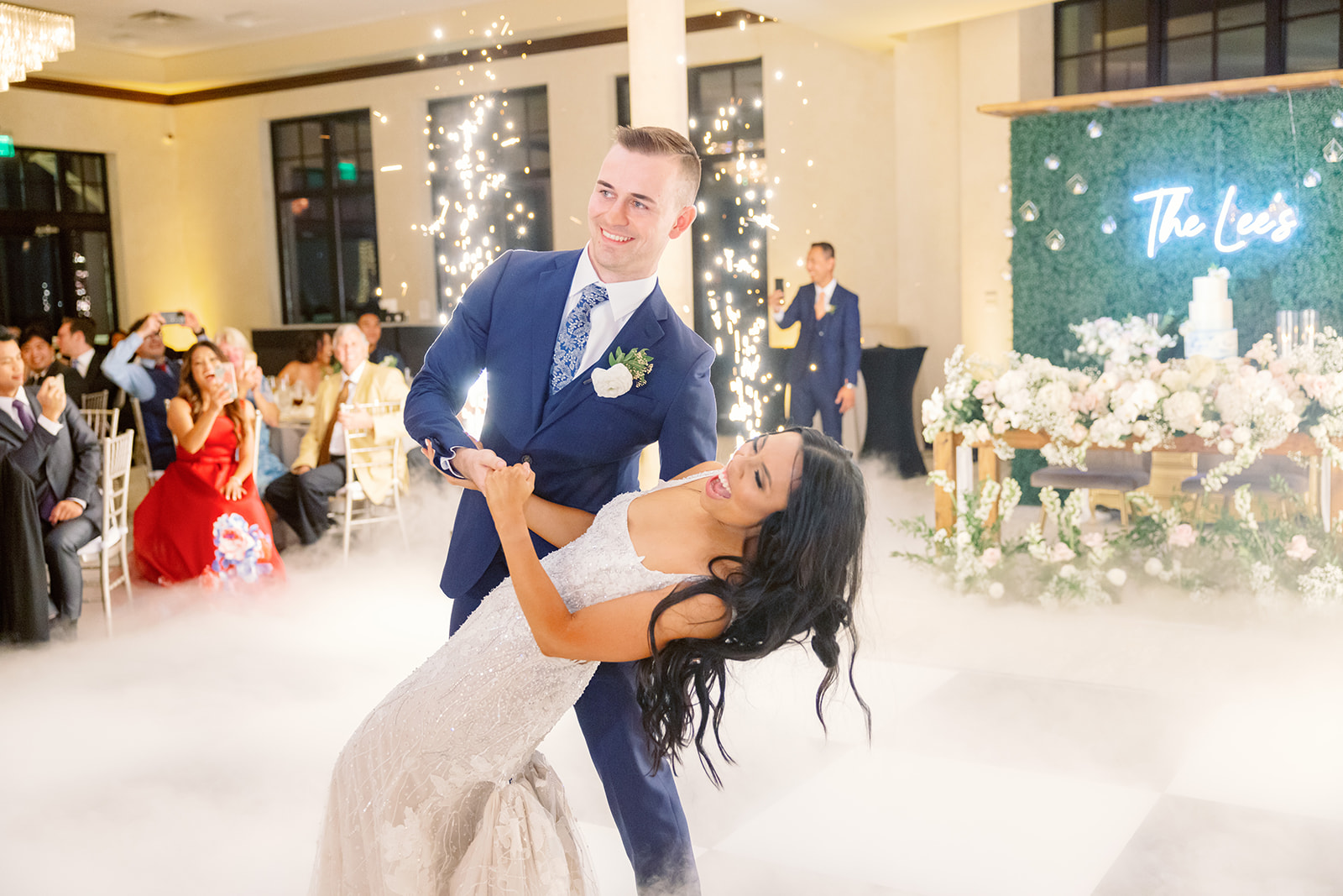 Adam dips Carlyn on the dance floor at their Bella Collina wedding