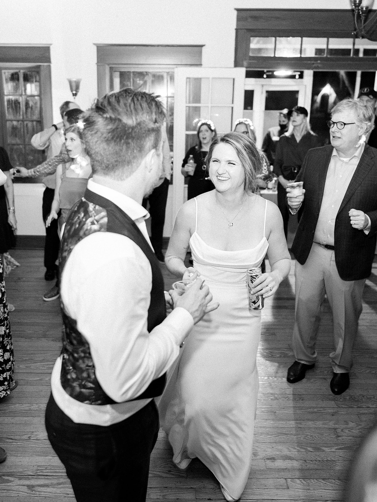 black and white photo of Darrick and Emily on the dance floor