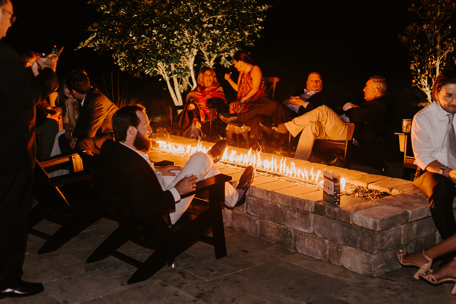 wedding guests around the firepit at The Mulberry NSB