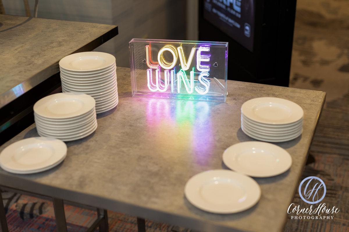 Neon "Love Wins" sign in rainbow colors