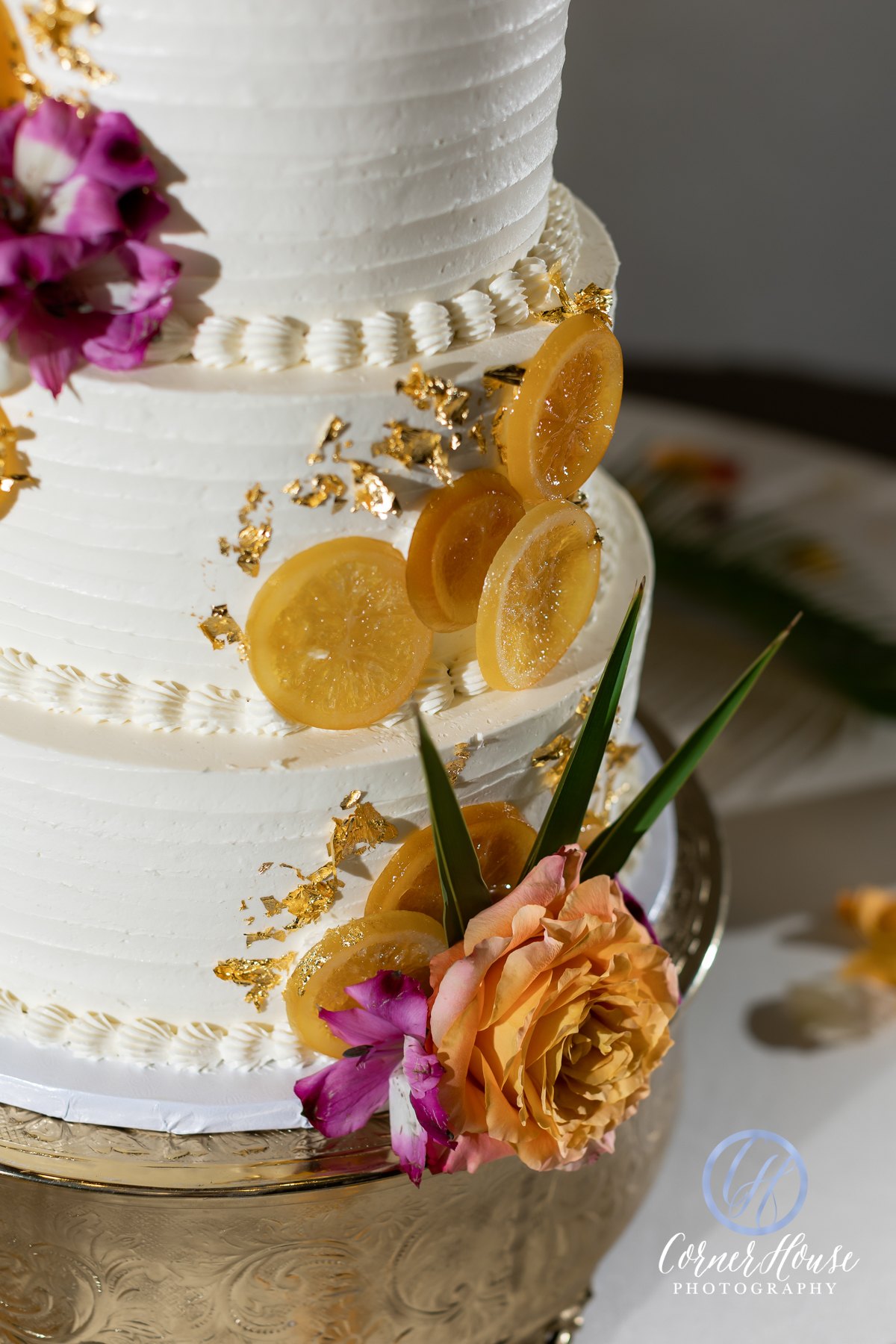 wedding cake decorated with citrus slices