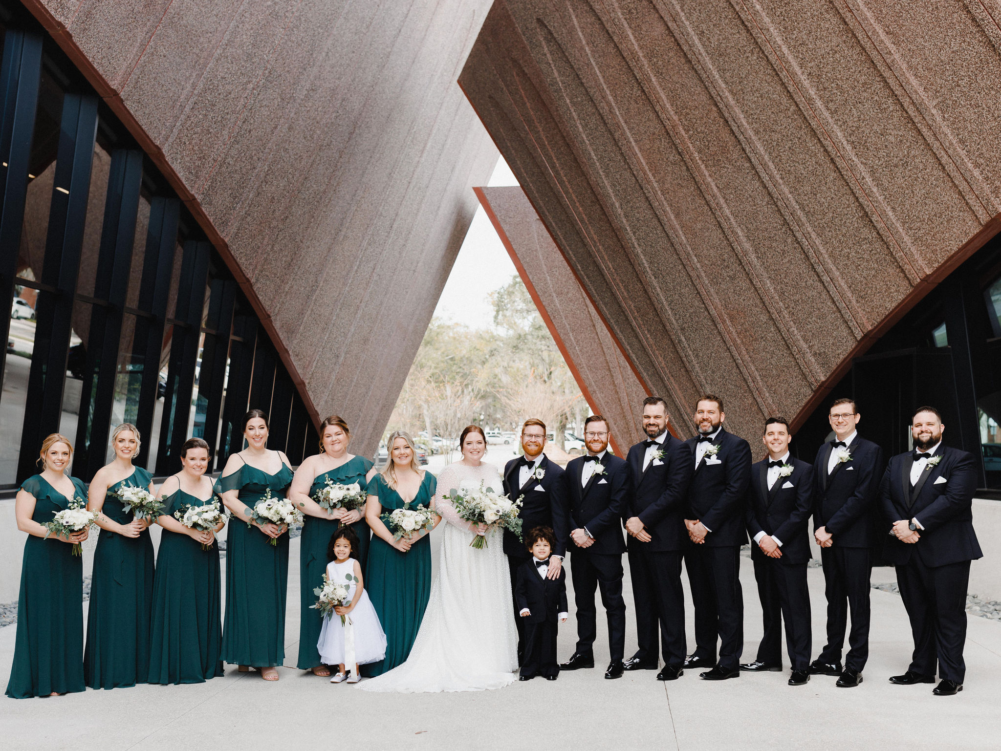 Katie and Bobby with their wedding party at the Winter Park Events Center