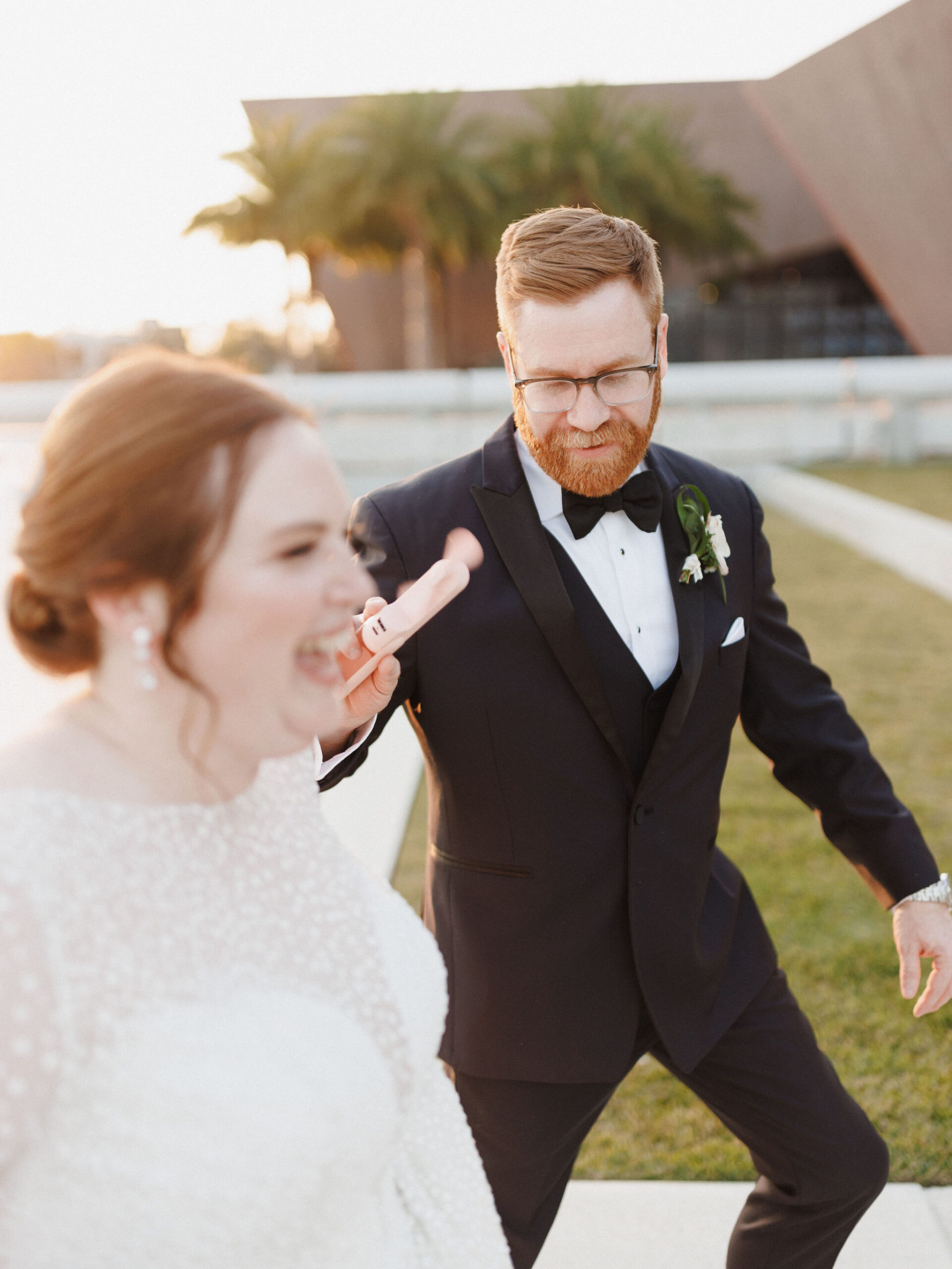 Katie and Bobby smiling at their wedding