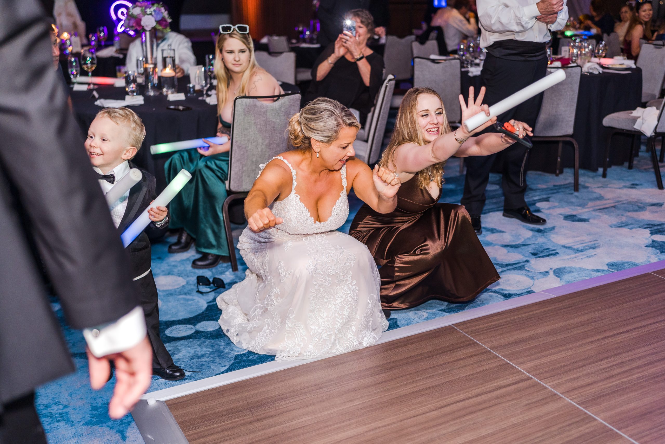 bride "dropping it low" with wedding guest