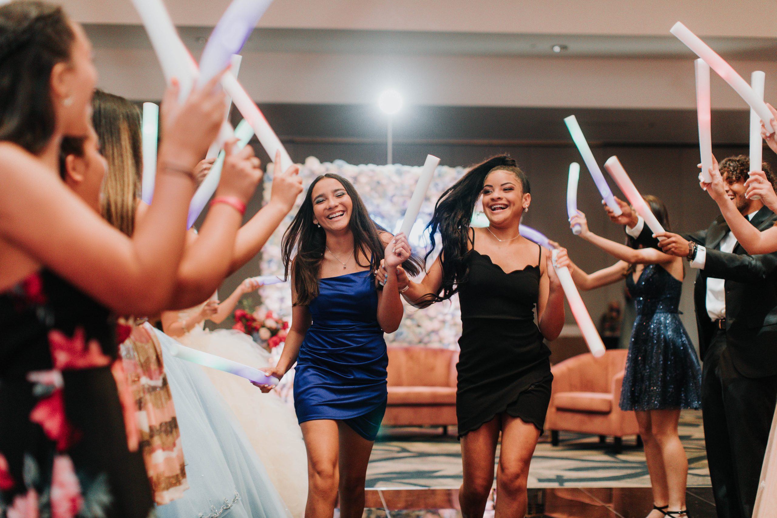 girls dancing for their friends at a sweet 16 party